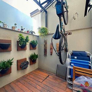 Sobrado com 93m², 2 dormitórios, 2 suítes, 1 vaga no bairro Morada das Palmeiras em Torres para Comprar