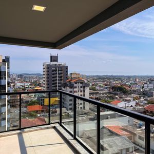 Apartamento com 110m², 3 dormitórios, 1 suíte, 2 vagas no Più Belle Residencial em Torres para Comprar