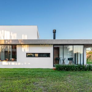 Casa de Condomínio com 218m², 3 dormitórios, 3 suítes, 2 vagas no Condomínio Ilhas Park em Torres para Comprar