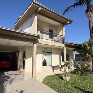 Casa, 3 dormitórios, 1 suíte, 1 vaga no bairro Igra Sul em Torres para Comprar