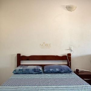 Casa com 228m², 3 dormitórios, 1 suíte, 2 vagas no bairro Stan em Torres para Comprar