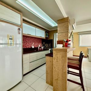 Apartamento com 118m², 3 dormitórios, 1 suíte, 2 vagas no Splendor em Torres para Comprar