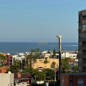 Apartamento com 95m², 3 dormitórios, 1 suíte, 2 vagas no Riverside em Torres para Comprar