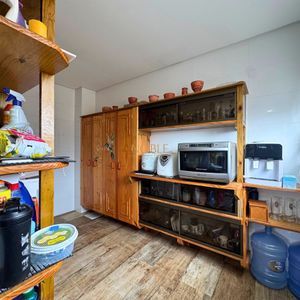 Casa com 180m², 3 dormitórios, 2 suítes, 2 vagas no bairro Caravelle em Passo de Torres para Comprar