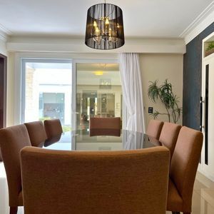 Casa com 600m², 4 dormitórios, 1 suíte, 4 vagas no bairro Igra Norte em Torres para Comprar