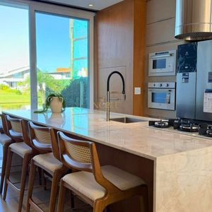Casa de Condomínio com 264m², 4 dormitórios, 4 suítes, 2 vagas no Reserva das Águas em Torres para Comprar