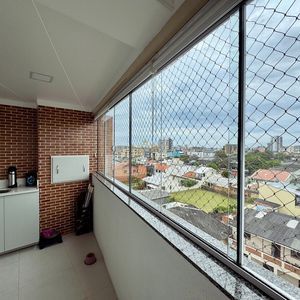Apartamento com 90m², 2 dormitórios, 1 suíte, 1 vaga no Edifício San Dilin em Torres para Comprar