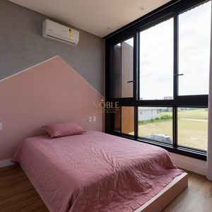 Casa de Condomínio com 244m², 4 dormitórios, 4 suítes, 2 vagas no Condomínio Ilhas Park em Torres para Comprar