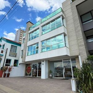 Duplex com 152m², 1 dormitório, 1 suíte, 2 vagas no Lumiere em Torres para Comprar