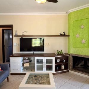 Casa com 156m², 3 dormitórios, 1 suíte, 4 vagas no bairro Praia Itapeva em Torres para Comprar