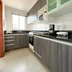 Apartamento com 76m², 2 dormitórios, 1 suíte, 2 vagas no Residencial Ilha Serena em Torres para Comprar