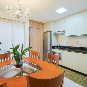 Geminado com 86m², 2 dormitórios, 2 suítes, 1 vaga no bairro Morada das Palmeiras em Torres para Comprar