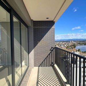 Apartamento com 91m², 2 dormitórios, 2 suítes, 2 vagas no Toronto em Torres para Comprar