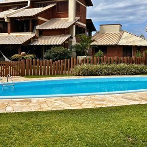 Casa de Condomínio com 161m², 5 dormitórios, 1 suíte, 3 vagas no Condomínio Plaza Guarita em Torres para Comprar