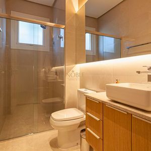 Casa com 263m², 3 dormitórios, 3 suítes, 2 vagas no Reserva das Águas em Torres para Comprar