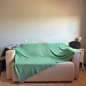 Casa com 209m², 3 dormitórios, 1 suíte, 2 vagas no bairro Igra em Torres para Comprar