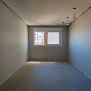 Apartamento com 114m², 3 dormitórios, 1 suíte, 2 vagas no Titanium em Torres para Comprar