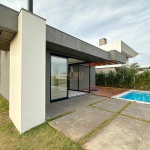 Casa de Condomínio com 228m², 3 dormitórios, 3 suítes, 2 vagas no Reserva das Águas em Torres para Comprar
