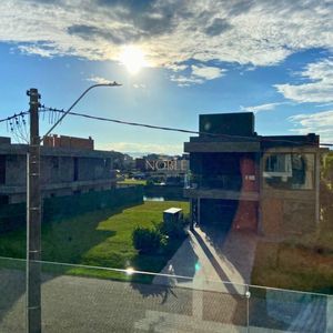 Casa de Condomínio, 4 dormitórios, 4 suítes, 2 vagas no Condomínio Ilhas Park em Torres para Comprar