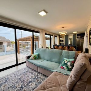 Casa com 670m², 5 dormitórios, 3 suítes, 3 vagas no bairro Bellatorres em Passo de Torres para Comprar