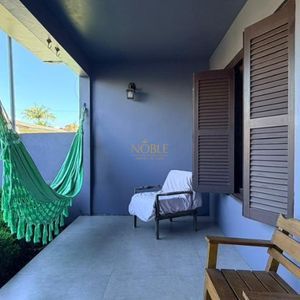 Casa com 228m², 3 dormitórios, 1 suíte, 2 vagas no bairro Stan em Torres para Comprar