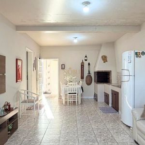 Casa com 171m², 4 dormitórios, 3 vagas no bairro Porto Alegre em Torres para Comprar