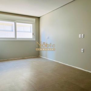 Apartamento com 119m², 3 dormitórios, 1 suíte, 2 vagas no Titanium em Torres para Comprar