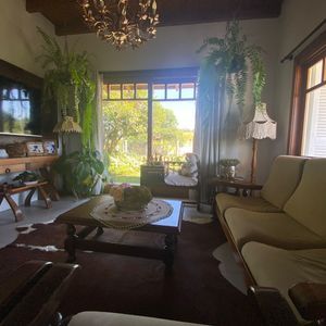 Casa com 135m², 3 dormitórios, 1 suíte, 1 vaga no bairro Bela Vista em Passo de Torres para Comprar