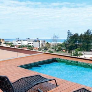 Apartamento com 83m², 2 dormitórios, 1 suíte, 1 vaga no Ed. Silva Jardim em Torres para Comprar