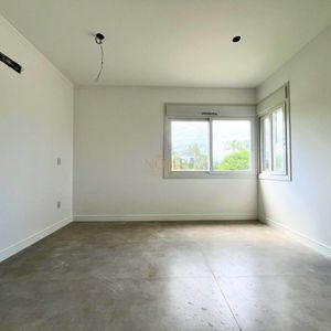 Casa de Condomínio com 180m², 4 dormitórios, 4 suítes, 2 vagas no Condomínio Ilhas Park em Torres para Comprar