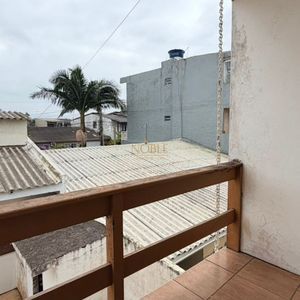 Casa com 130m², 4 dormitórios, 4 vagas no bairro Getúlio Vargas em Torres para Comprar