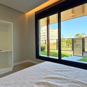 Casa com 180m², 3 dormitórios, 1 suíte, 2 vagas no bairro Praia da Cal em Torres para Comprar