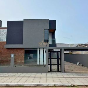 Geminado com 106m², 3 dormitórios, 1 suíte, 1 vaga no bairro Praia da Cal em Torres para Comprar