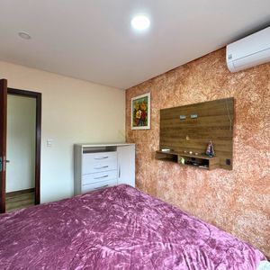 Casa com 180m², 3 dormitórios, 2 suítes, 2 vagas no bairro Caravelle em Passo de Torres para Comprar