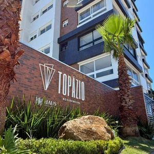 Apartamento com 70m², 2 dormitórios, 1 suíte, 1 vaga no Topazio em Torres para Comprar