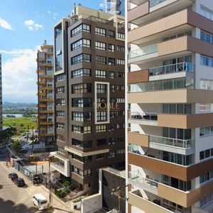 Apartamento com 118m², 3 dormitórios, 3 suítes, 2 vagas no Freedom em Torres para Comprar