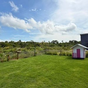 Casa com 258m², 4 dormitórios, 4 suítes, 2 vagas no Reserva das Águas em Torres para Comprar