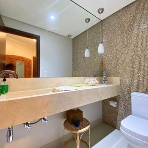 Casa com 518m², 5 dormitórios, 2 suítes, 2 vagas no bairro Praia Grande em Torres para Comprar