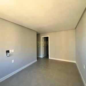 Apartamento com 102m², 3 dormitórios, 1 suíte, 2 vagas no Maui Residencial em Torres para Comprar