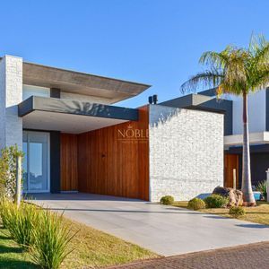 Casa com 263m², 3 dormitórios, 3 suítes, 2 vagas no Reserva das Águas em Torres para Comprar