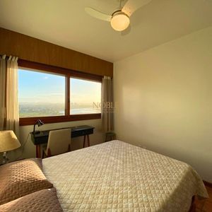 Apartamento com 102m², 2 dormitórios, 1 suíte, 1 vaga no La Tour em Torres para Comprar