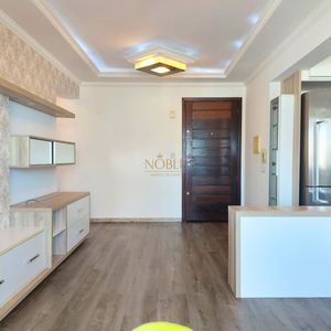 Apartamento com 54m², 1 dormitório, 1 vaga no Ed. Fenix Center em Torres para Comprar