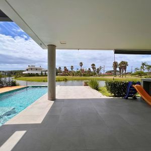 Casa de Condomínio com 348m², 4 dormitórios, 3 suítes, 2 vagas no Condomínio Ilhas Park em Torres para Comprar