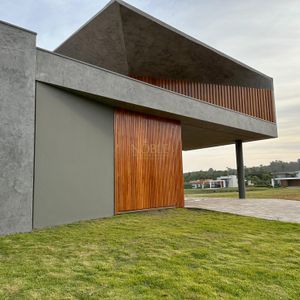 Casa de Condomínio com 228m², 3 dormitórios, 3 suítes, 2 vagas no Reserva das Águas em Torres para Comprar