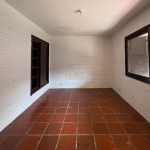 Casa com 100m², 2 dormitórios, 3 vagas no bairro Praia da Cal em Torres para Comprar