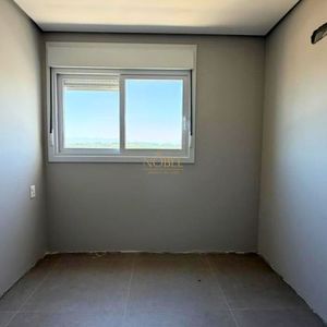 Apartamento com 70m², 2 dormitórios, 1 suíte, 1 vaga no Topazio em Torres para Comprar