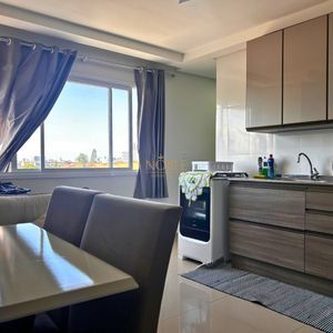 Apartamento com 60m², 2 dormitórios, 1 suíte, 1 vaga no Residencial Morada do Sol em Torres para Comprar