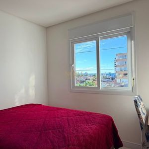 Apartamento com 83m², 2 dormitórios, 1 suíte, 2 vagas no Bellagio Residenziale em Torres para Comprar