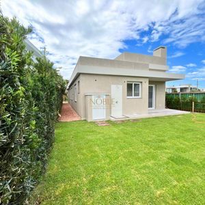 Casa de Condomínio com 180m², 4 dormitórios, 4 suítes, 2 vagas no Condomínio Ilhas Park em Torres para Comprar