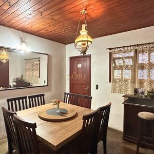 Casa, 3 dormitórios, 2 vagas no bairro Centro em Torres para Comprar